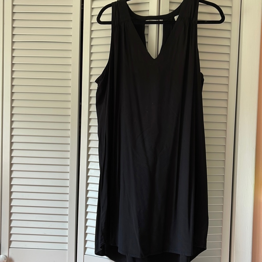 black no sleeve, medium length dress